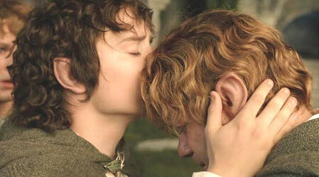 A screencap of a scene from The Lord of the Rings: Return of the King, in which Frodo is kissing Samwise’s forehead.